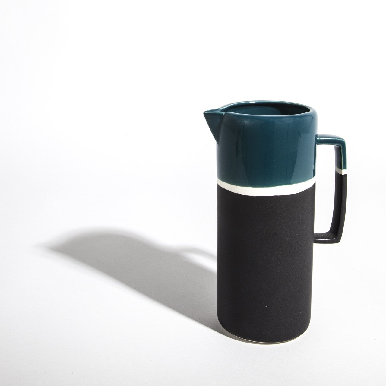 Graphic lines, deep colours and double finish effect matte and shiny, this retro-looking jug has been designed by Maison Sarah Lavoine and handmade traditionally by skilled artisans at Jars Ceramists in southern France. | 